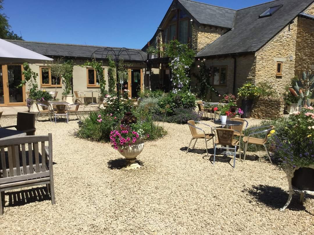 The beautiful sunny courtyard garden at Jennie's Kitchen, Ashton Keynes
